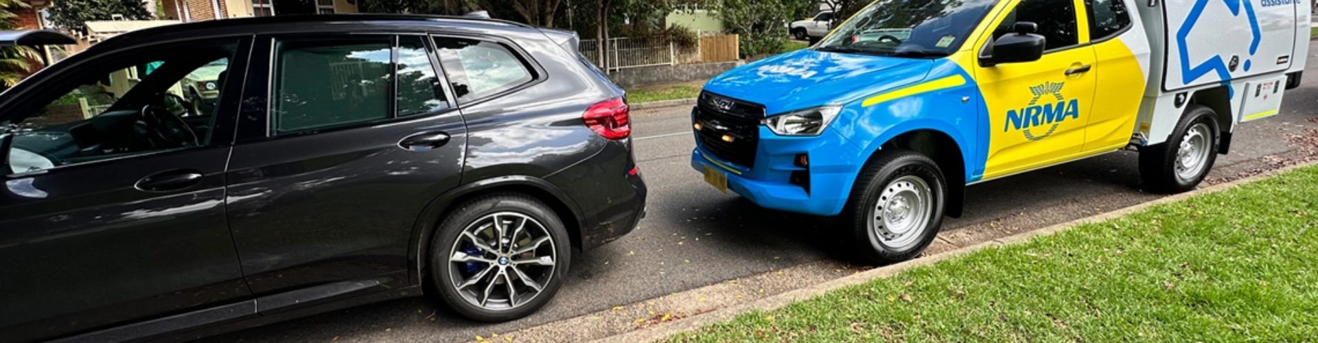 An NRMA roadside assist van attends to a locked car