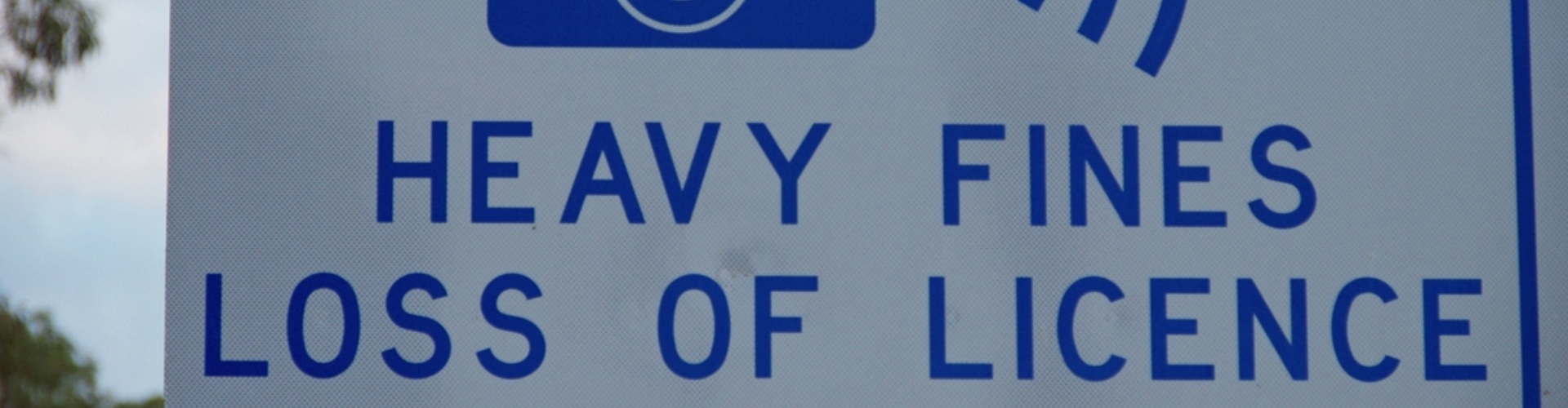 A roadside speed fine warning sign