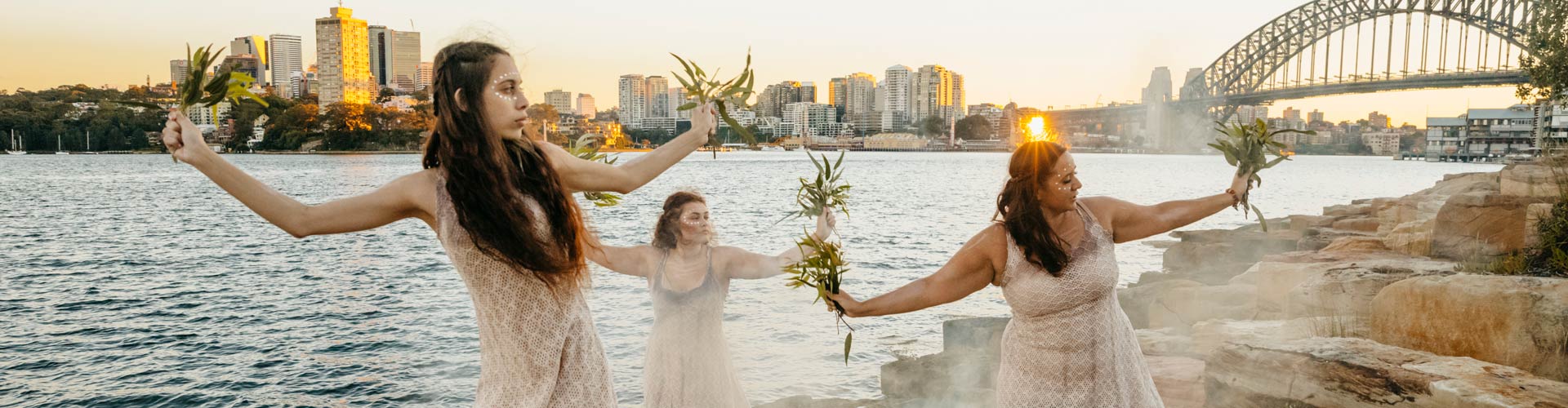 Aboriginal dancers from the Jannawi Dance Clan sharing an immersive cultural experience during an Aboriginal Cultural Tour in Barangaroo, Sydney