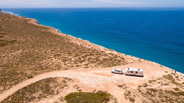 white car and caravan at a lookout on the Bunda cliffs