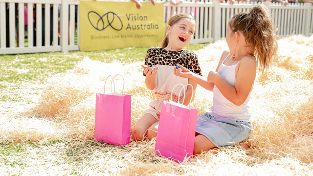 Two young girls excited over easter eggs