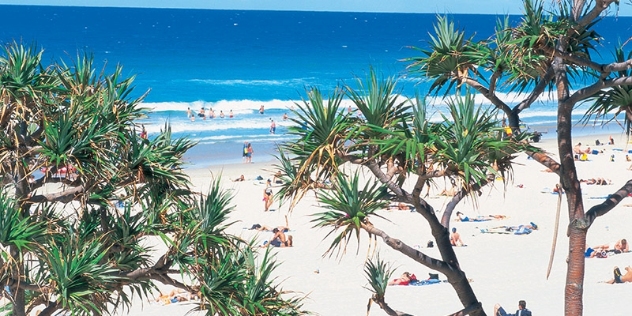 People enjoying the beach at Surfers Paradise Gold Coast QLD