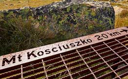 Hiking path showing distance to Mount Kosciuszko