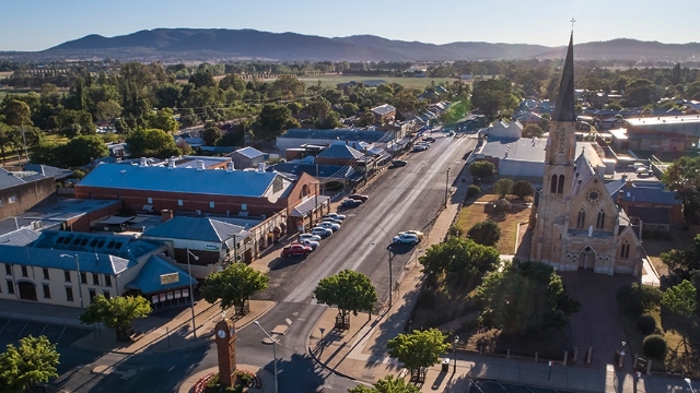 Mudgee streetscape arial view NSW arial view of Mudgee with church and a mix of historic and modern shop fronts