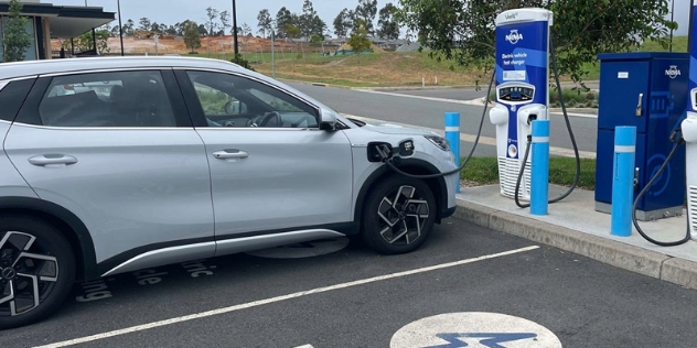 electric vehicle plugged into NRMA fast charger at Port Macquarie