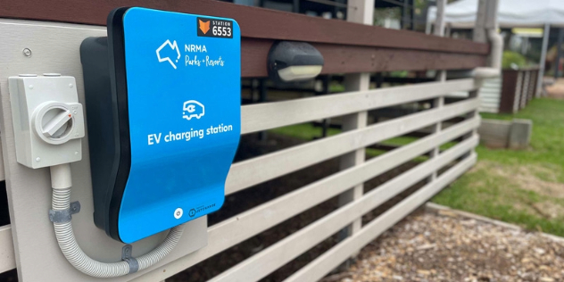 close up of NRMA EV charging station on a studio cabin at the Port Macquarie Breakwall Holiday Park