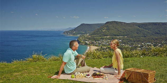 Couple picnic at Stanwell Tops lookout NSW