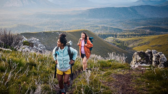 two-women-hiking-valley-640x360