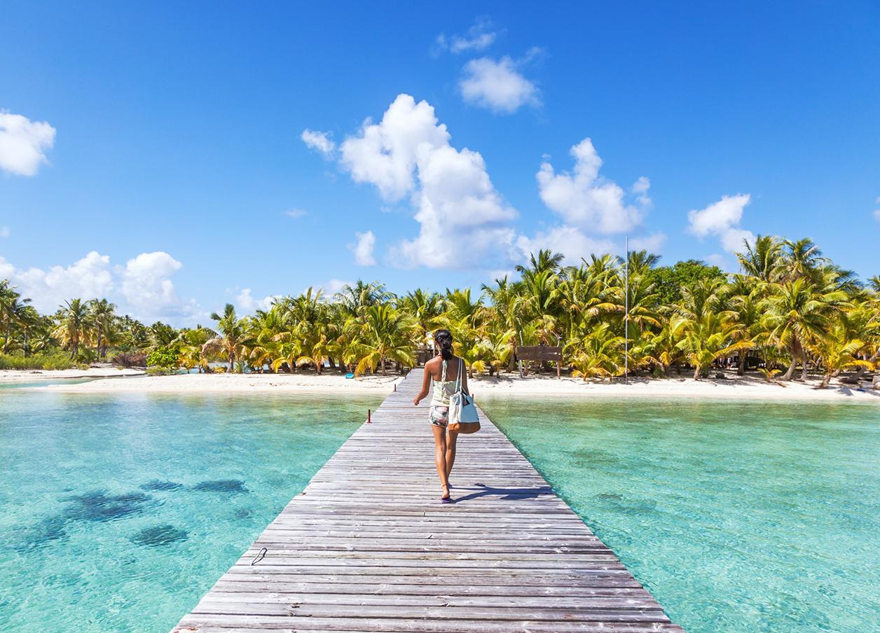 Woman tropical holiday with international travel insurance