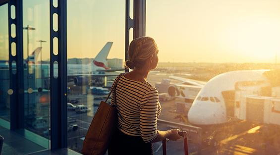 Travel insurance woman at airport