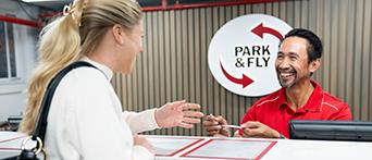 Park & Fly woman at reception