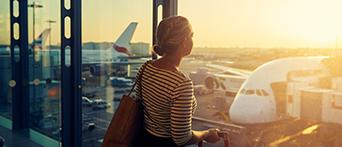 Travel insurance woman waiting for flight